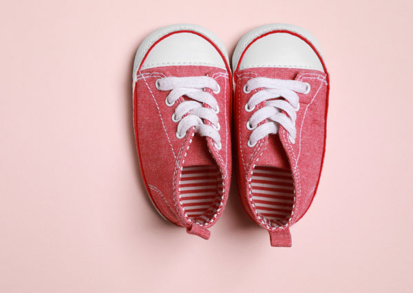 A pair of pink children's shoes